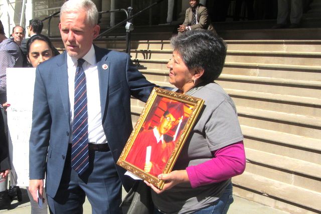 Councilmember Jimmy Van Bramer and Marta Puruncajas, whose son was killed by a hit and run driver who remains at large.